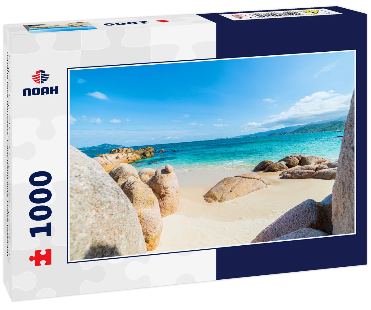 Gorgeous tropical beach turquoise transparent water unique rock boulders, Cam Ranh Nha Trang Vietnam