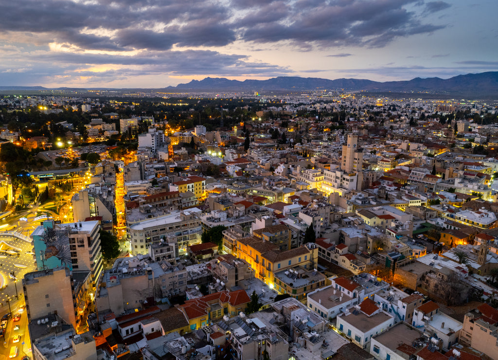 Aerial drone photograph of cityscape of Nicosia in Cyprus at sunset