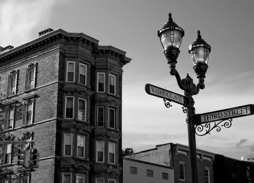 Corner of Washington and Third streets in downtown Hoboken, New Jersey in black white