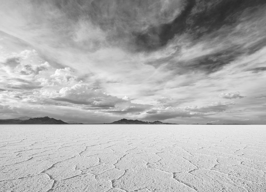 Wide Angle Closeup of White Salt Flats during sunset near Salt Lake City, Utah in black white