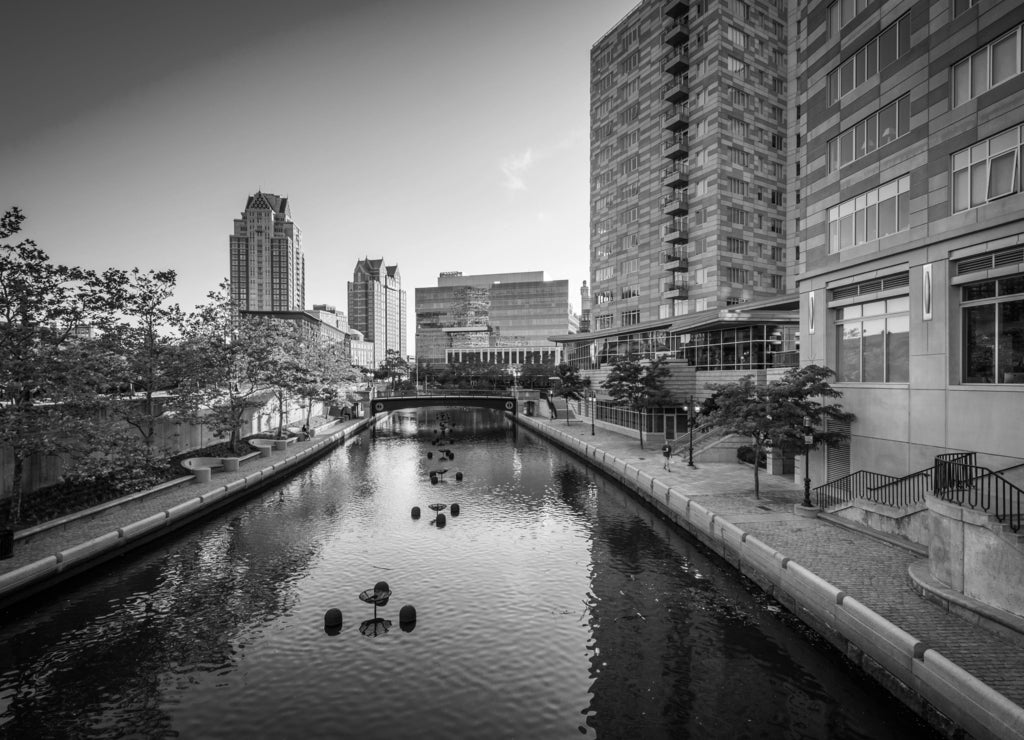 Modern buildings and the Providence River, in downtown Providence, Rhode Island in black white