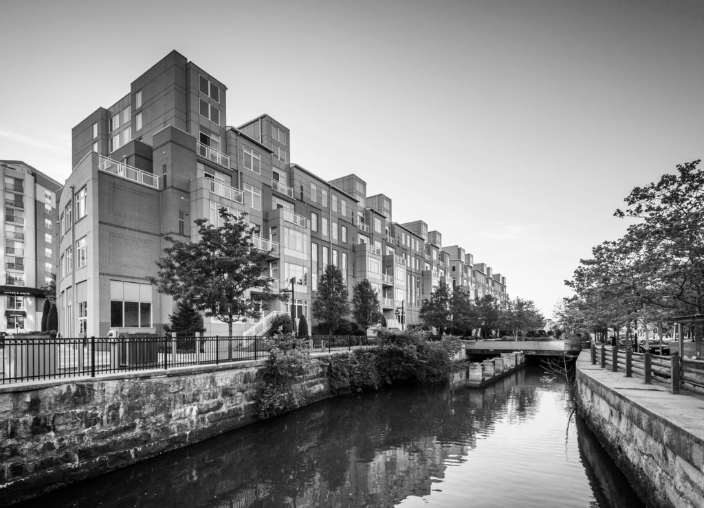 Modern buildings and the Providence River, in downtown Providence, Rhode Island in black white