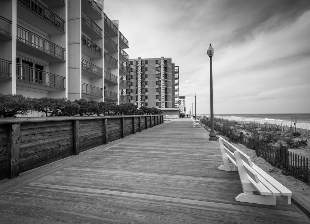 The boardwalk in Rehoboth Beach, Delaware in black white