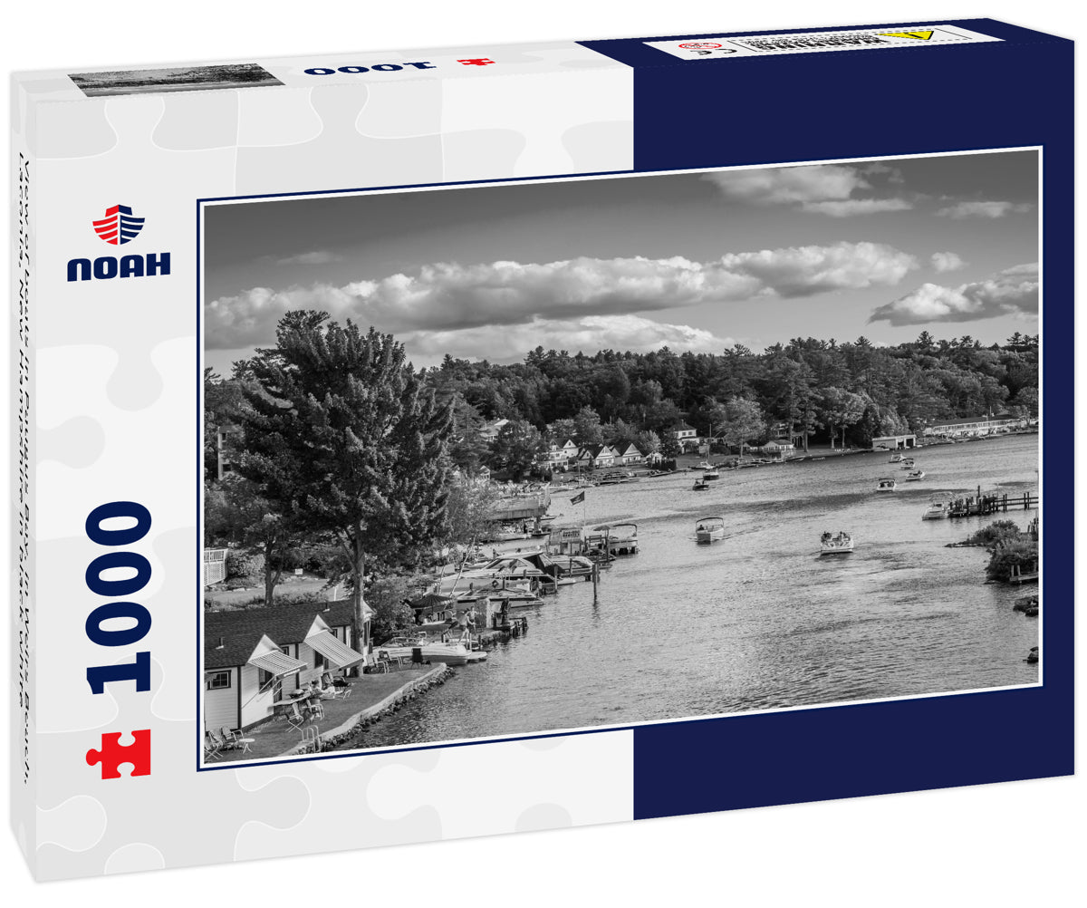 View of boats in Paugus Bay, in Weirs Beach, Laconia, New Hampshire in black white