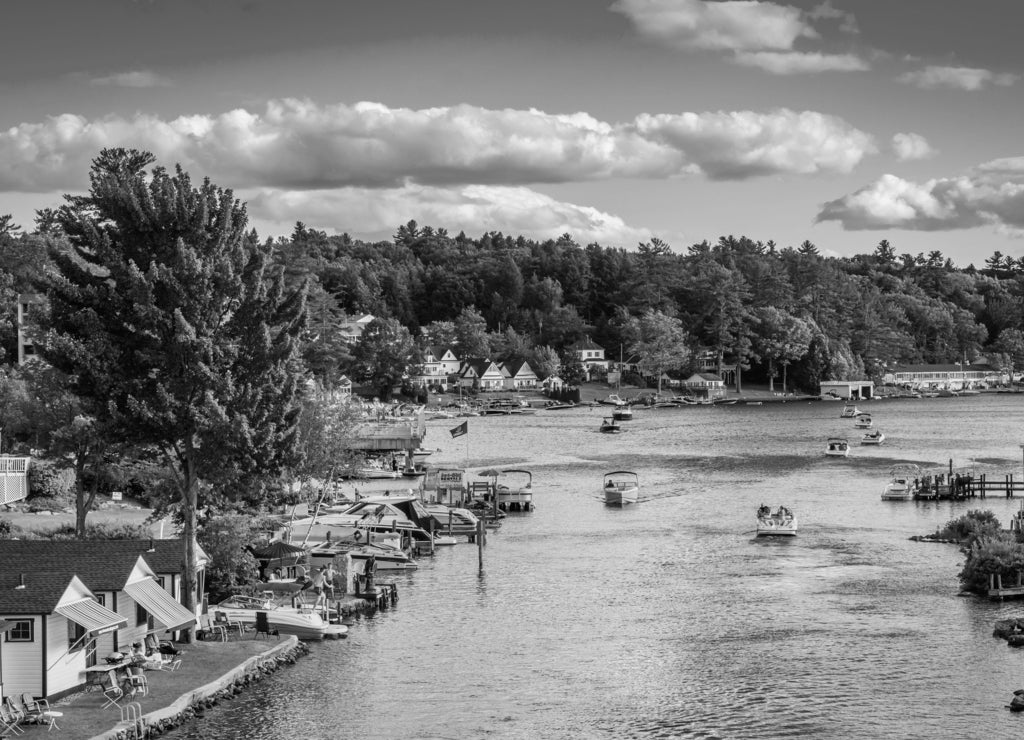 View of boats in Paugus Bay, in Weirs Beach, Laconia, New Hampshire in black white