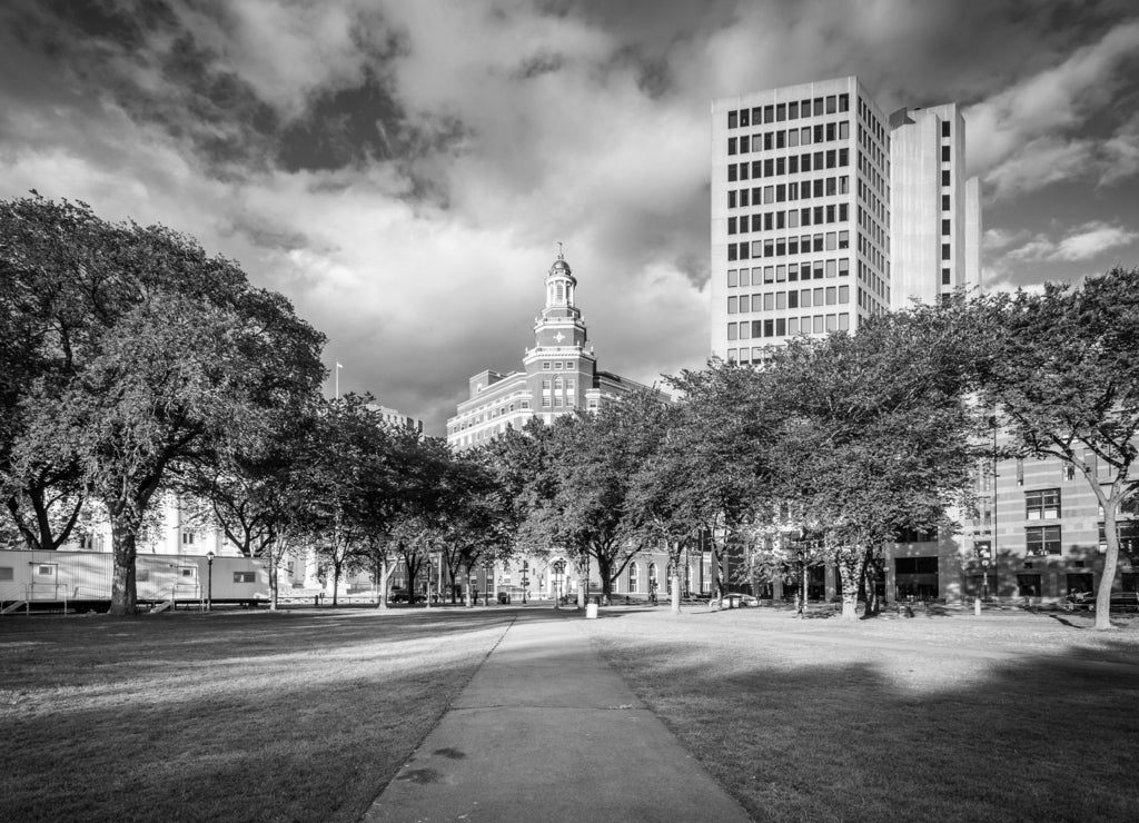 Walkways at the New Haven Green and buildings in downtown, Connecticut in black white