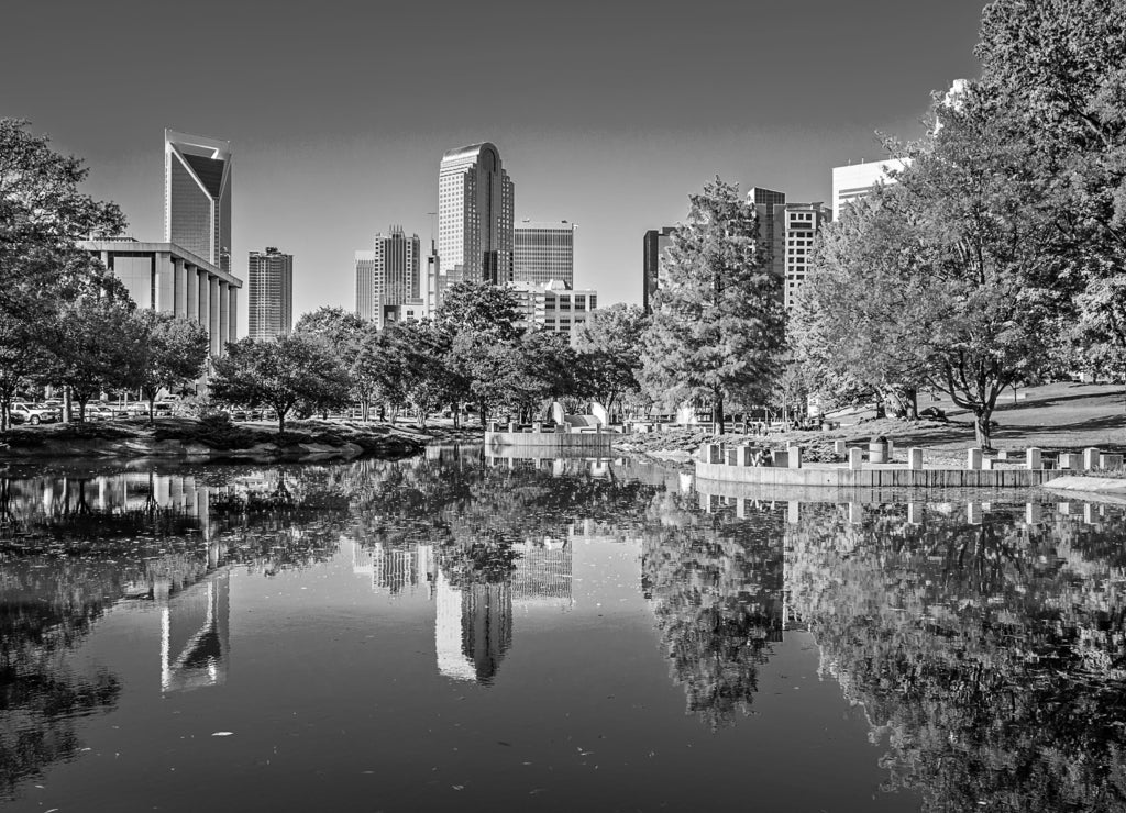 Charlotte city skyline from marshall park autumn season North Carolina in black white