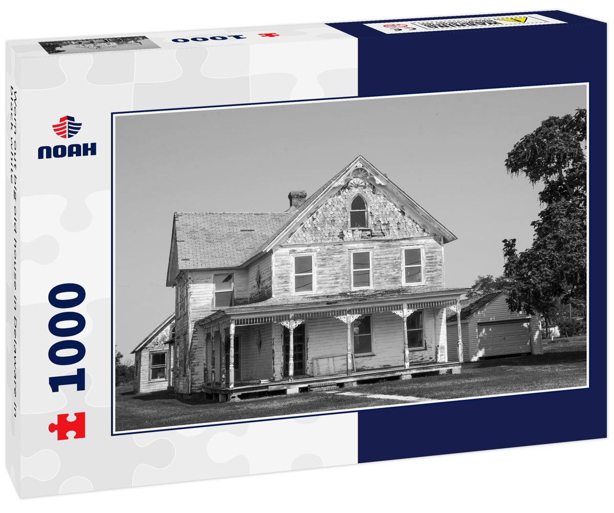 Worn out big old house in Delaware in black white