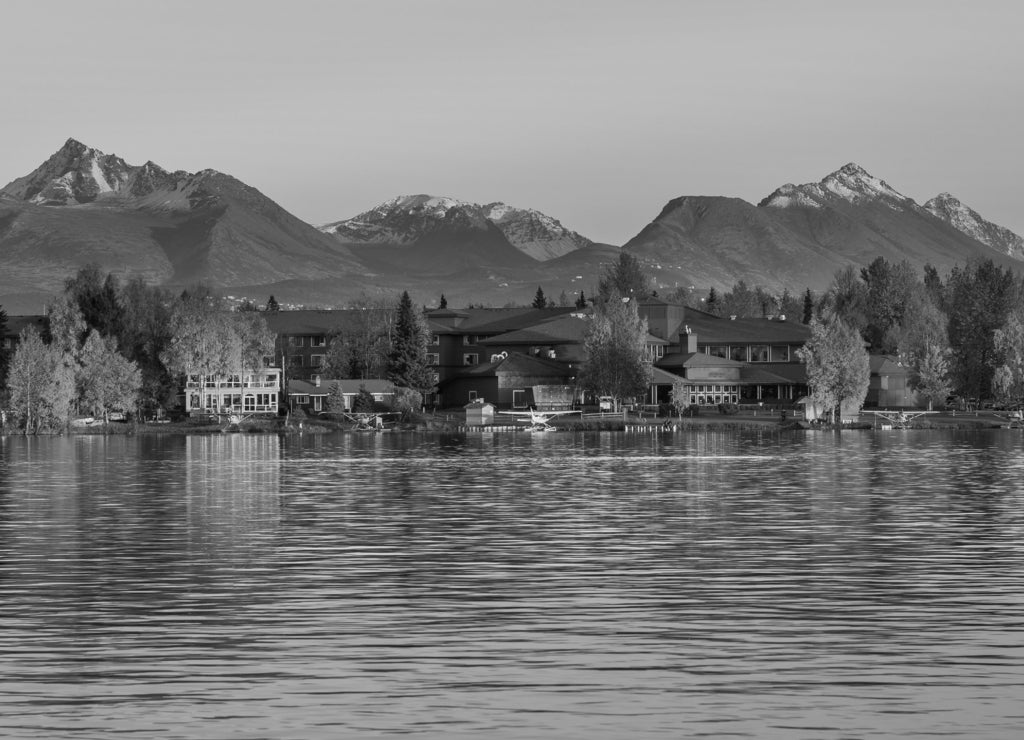 Warm colors of sunset at Spenard Lake in Anchorage, Alaska, USA in black white