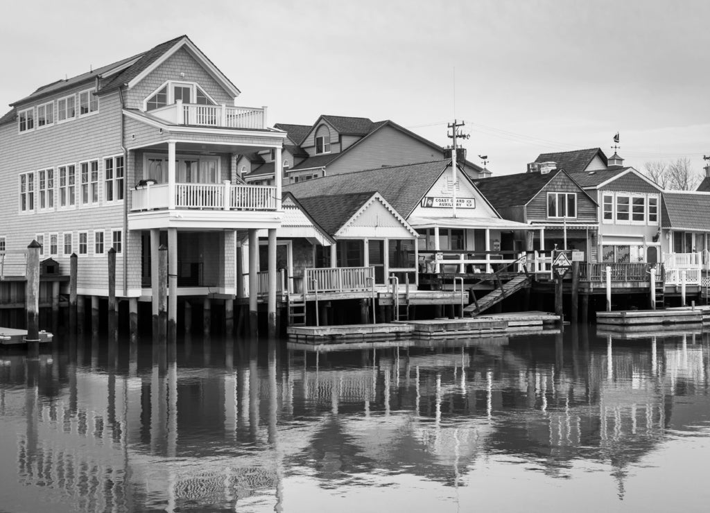 Houses along Cape May Harbor, in Cape May, New Jersey in black white