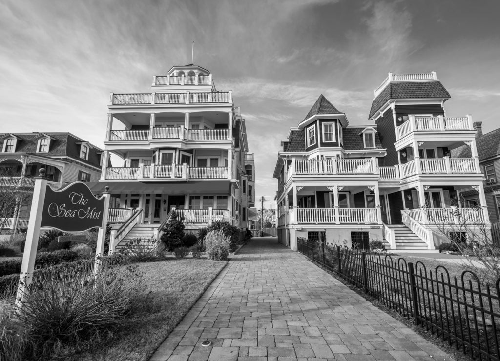 Houses along Beach Avenue, in Cape May, New Jersey in black white