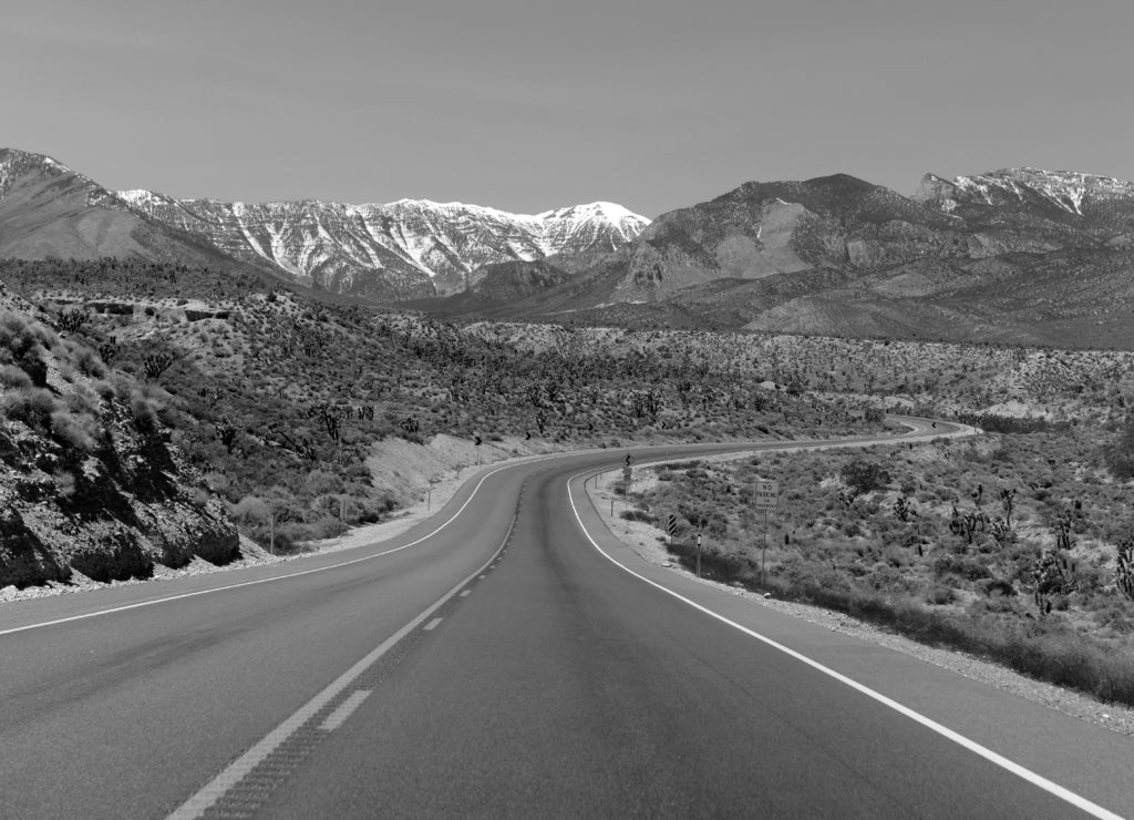 Driving into the Spring Mountains, near Las Vegas Nevada in black white