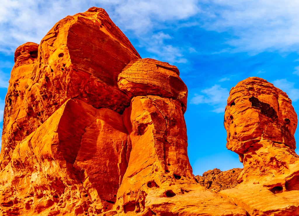 The Seven Sisters, a bright red Aztec sandstone rock formation in the Valley of Fire State Park in Nevada, USA