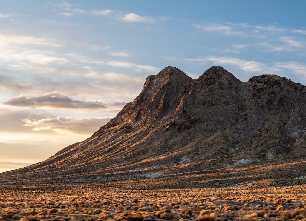 USA, Nevada, Nye County, Tonopah. The southwest face of Mt. Butler (7,116 ft, 2,169 m) at sunset. The peak is named after the founder of the nearby town