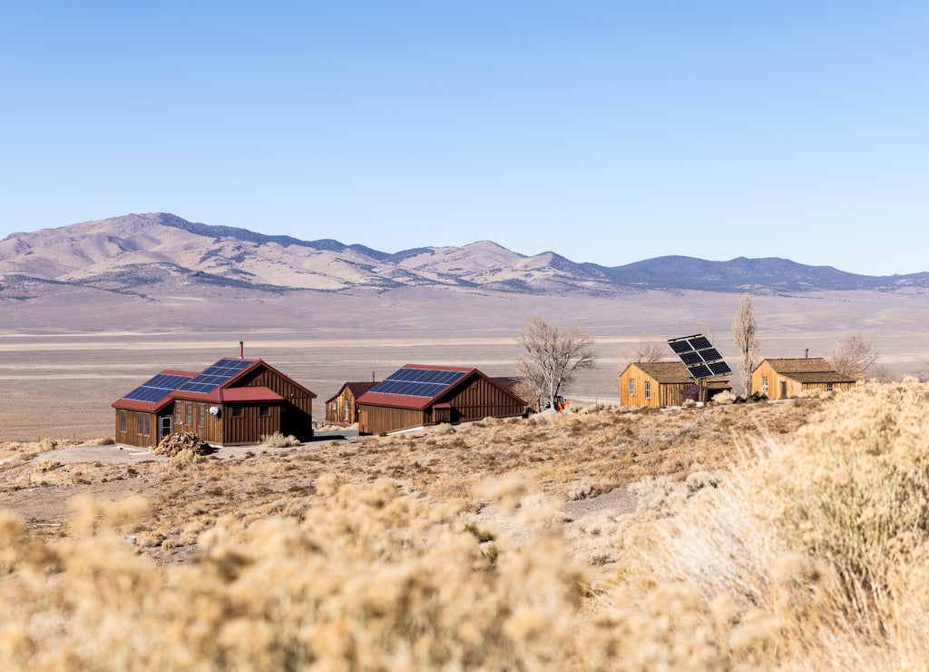 Desert landscape near Berlin ghost town in Nevada with park buildings in the foreground