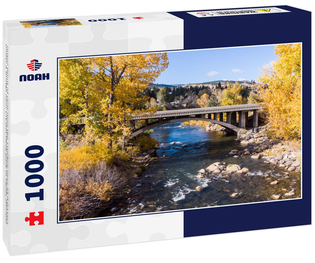 Drone point of view over the Truckee river as it passes under a bridge near Crystal Peak park in Verdi, Nevada 