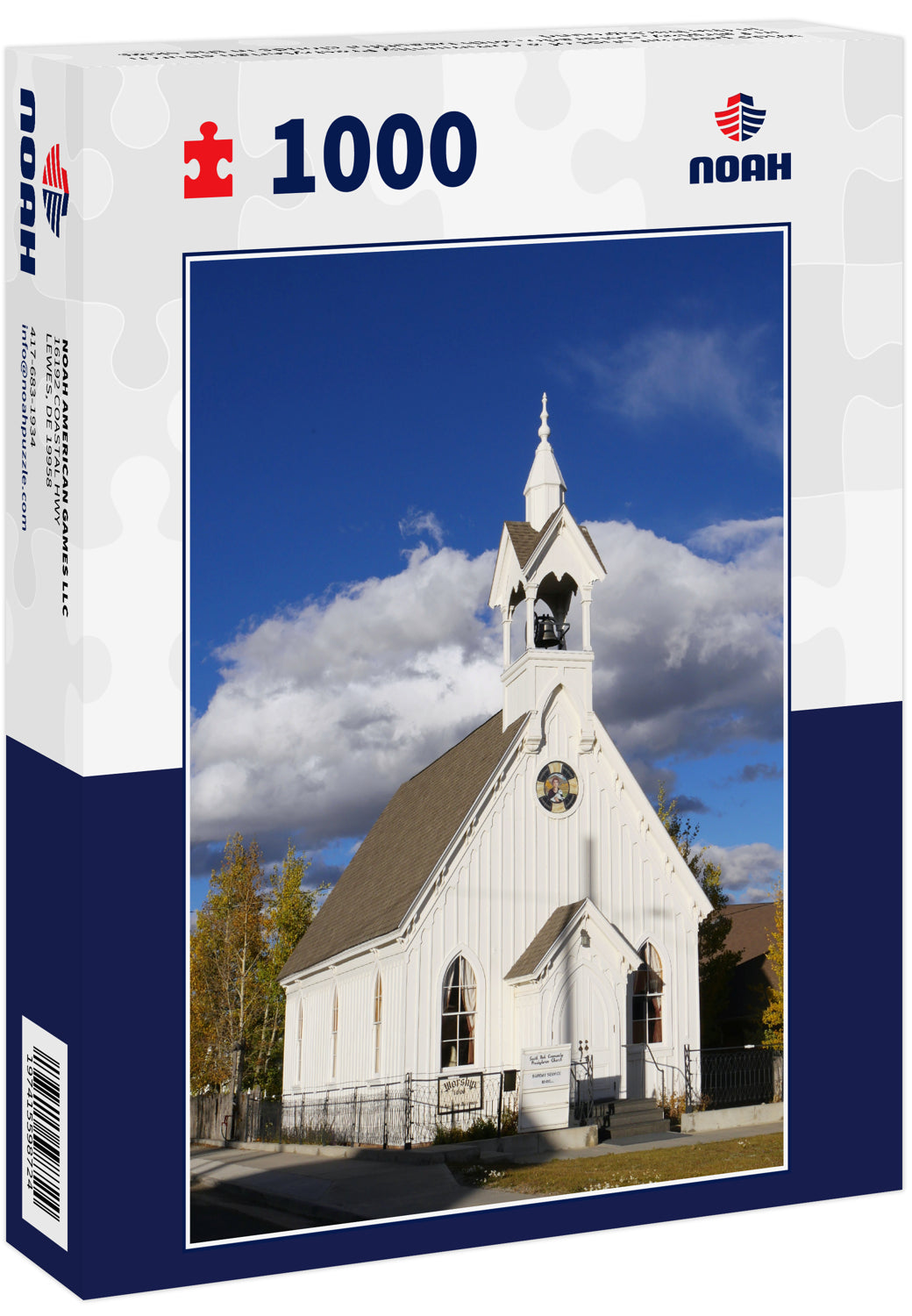 Wide portrait shot of a community Presbyterian church in Fairplay, Colorado, with beautiful clouds in the skies in the background