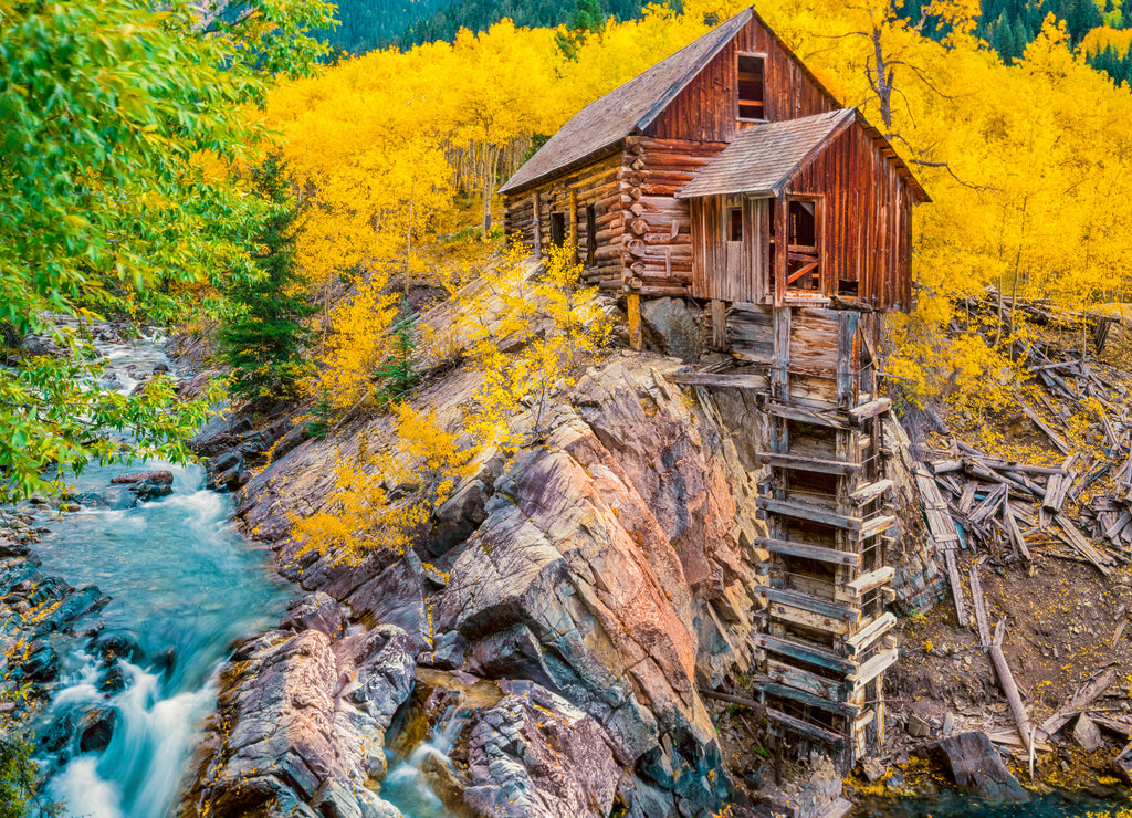 Crystal Mill and Crystal River sit in the middle of Gunnison National Forest in fall in Colorado