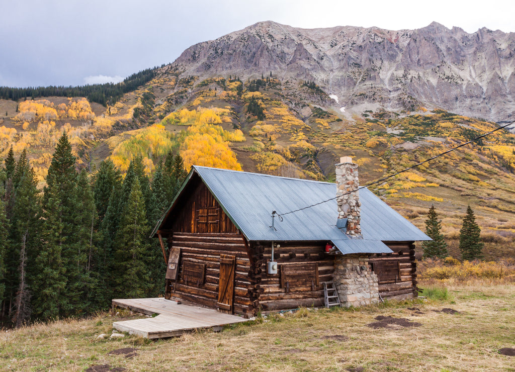 Gothic Cabin - Rustic log cabin with a tin roof on the edge of town in Gothic Colorado in Gunnison County in Autumn