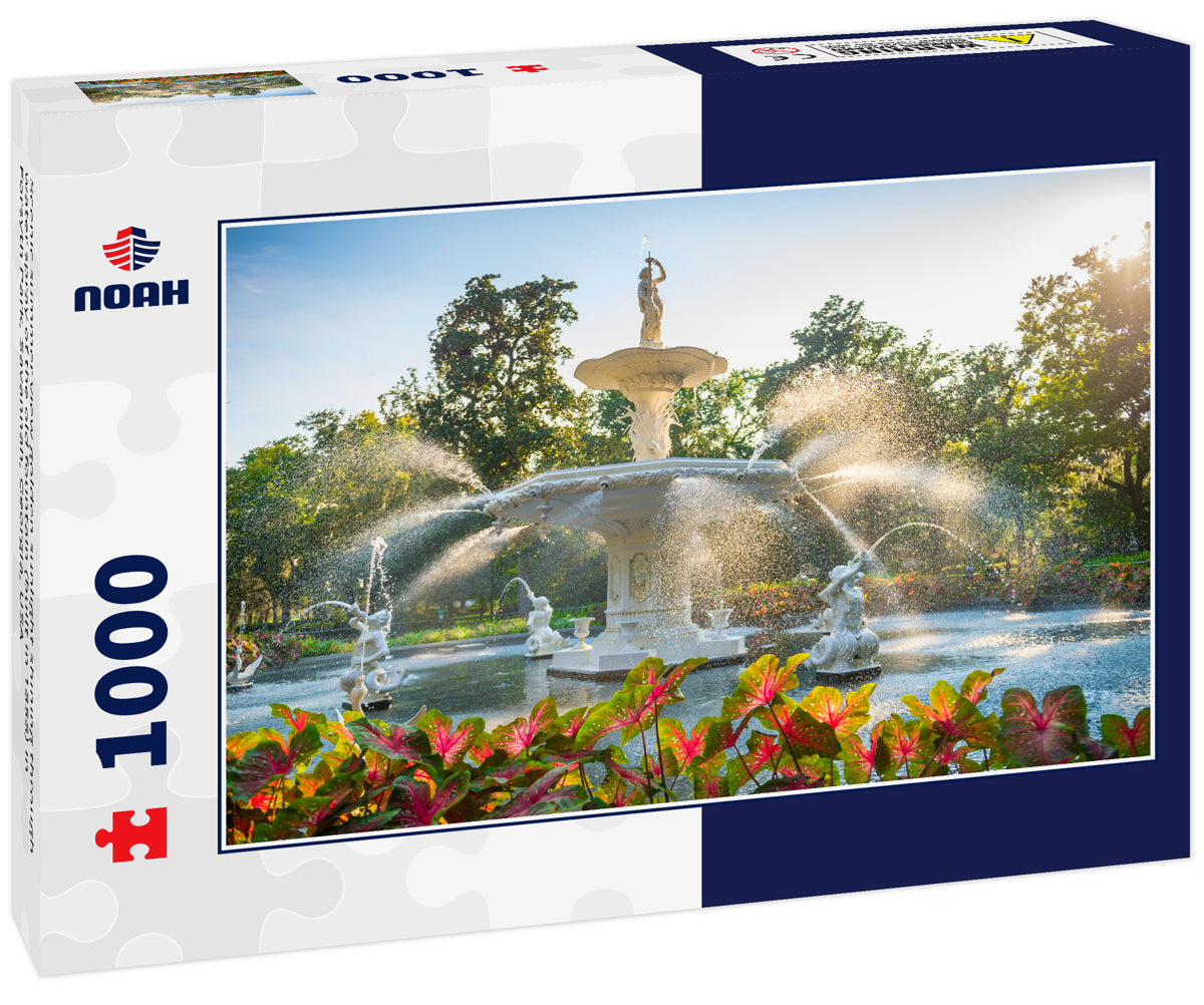 Scenic summer view golden sunlight shining through water spray of the old fountain (built in 1858) in Forsyth Park, Savannah, Georgia, USA