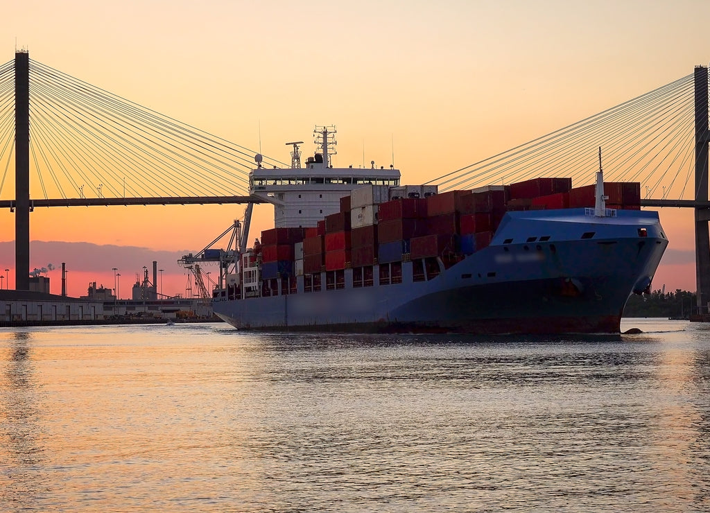 Commercial cargo ship as it leaves the Port of Savannah in Georgia