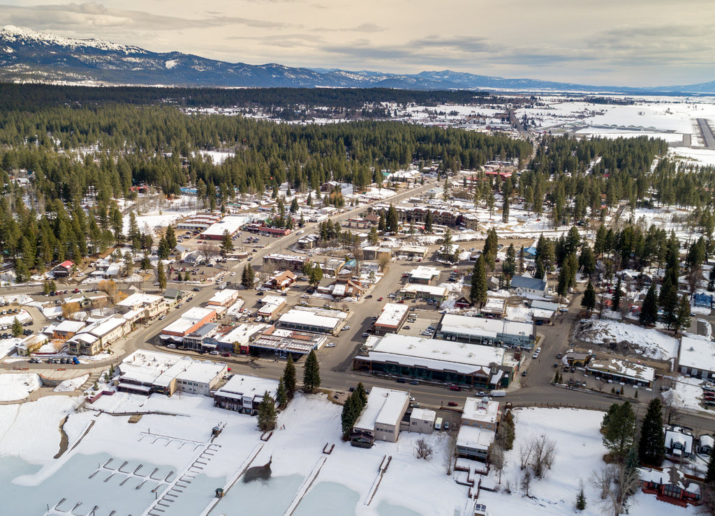 High elevation overhead view of McCall Idaho with mountains and snow on the ground