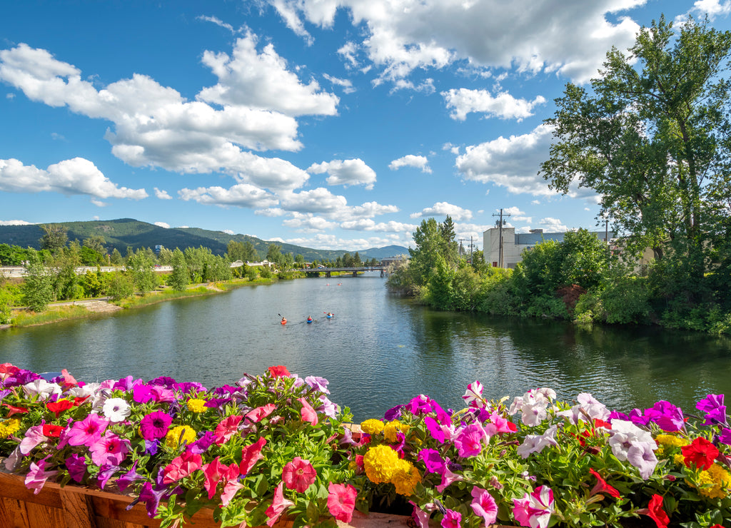 Kayakers enjoy a summer sunny day on Lake Pend Oreille and Pend Oreille River in the town of Sandpoint, Idaho