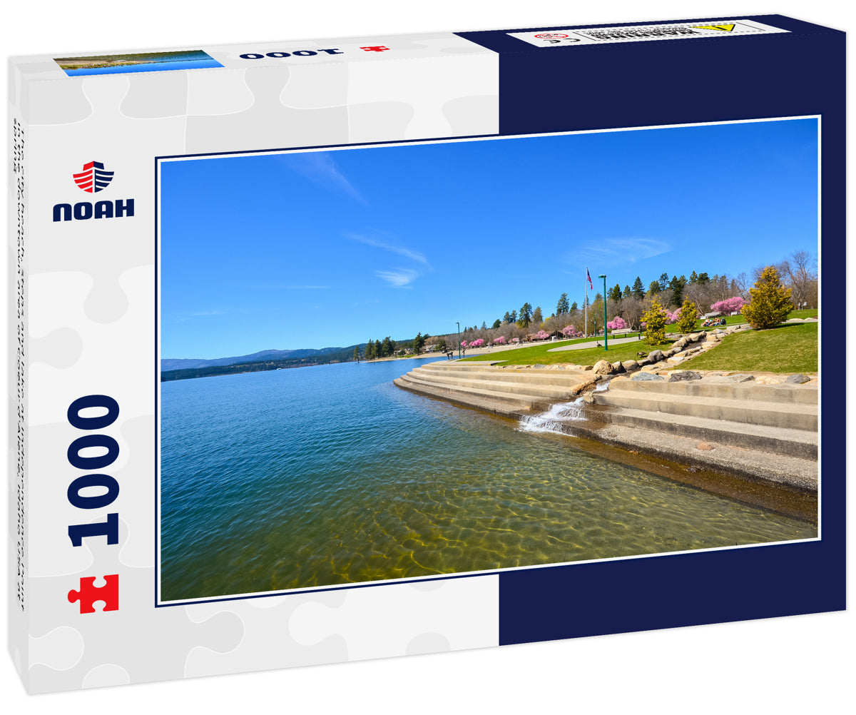 The city beach, steps and lake at Independence Point in the downtown area of Coeur d'Alene, Idaho USA at spring