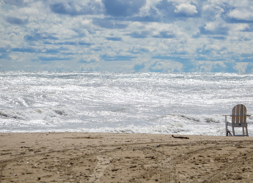 High winds churn up waves on Lake Michigan's Illinois shoreline. The water was closed at local beaches due to rough surf