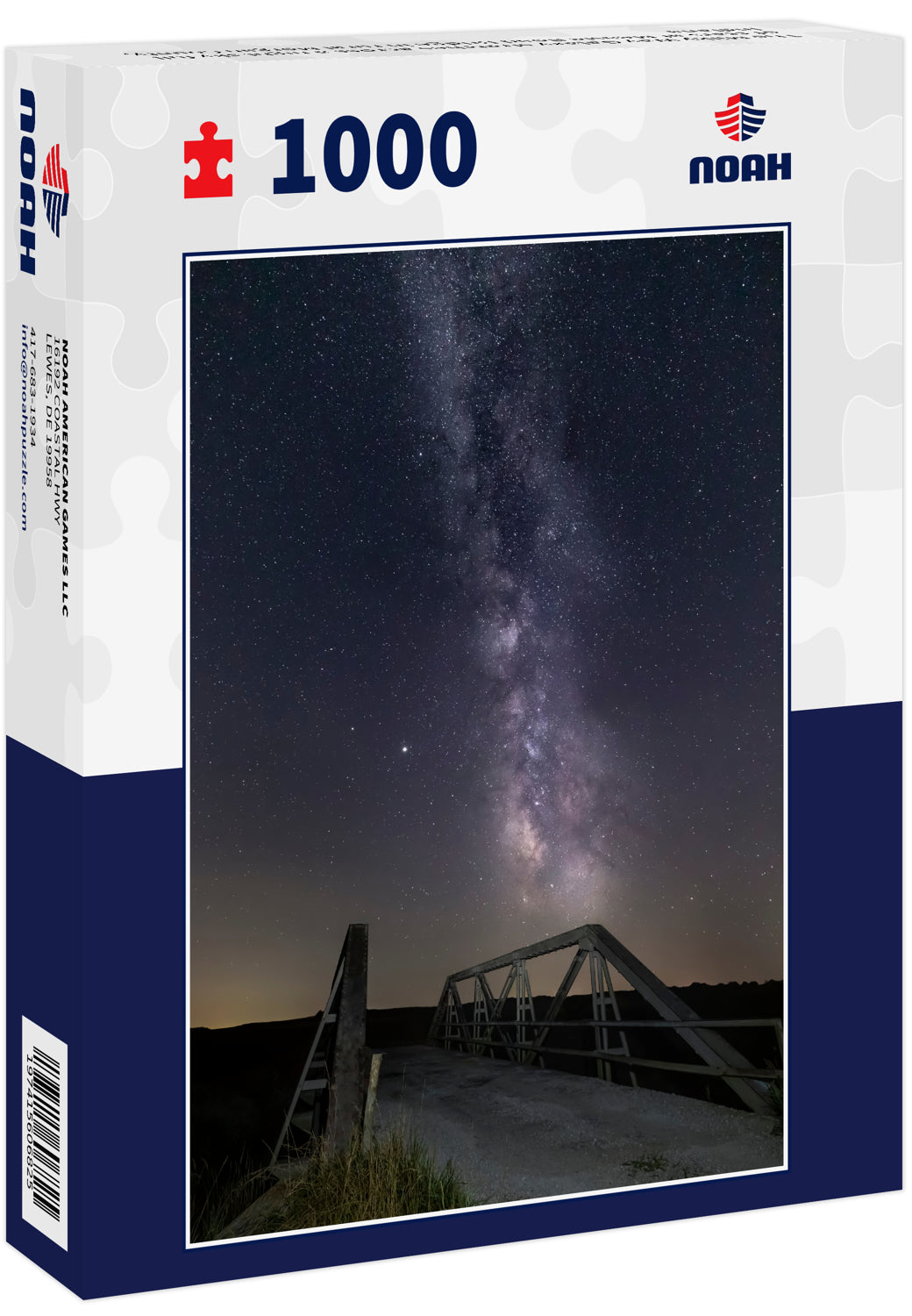 The Milky Way Galaxy stretches across a night sky full of stars at Measle Road Bridge in rural Morgan County, Indiana