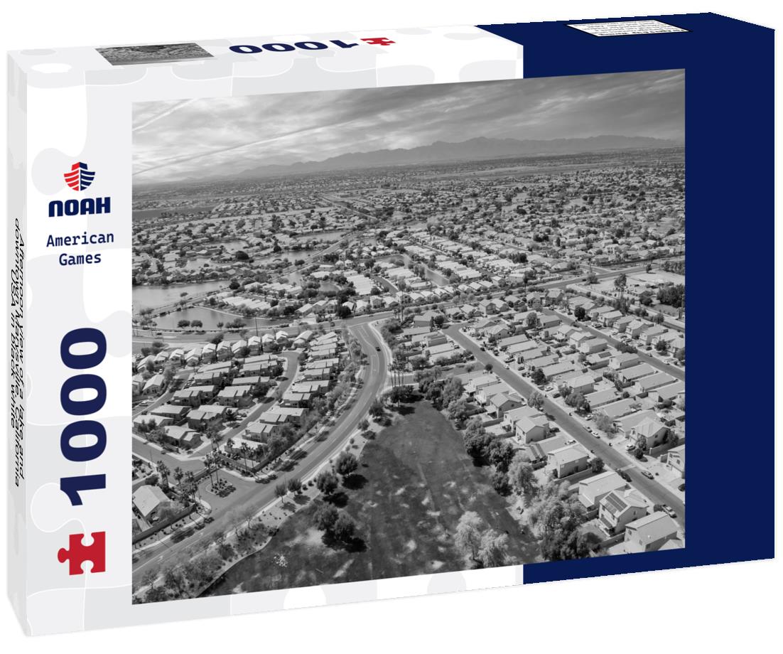 Noah Jigsaw Puzzle Afternoon view of a lake and downtown Marysville, California, USA in black white 1000 pieces