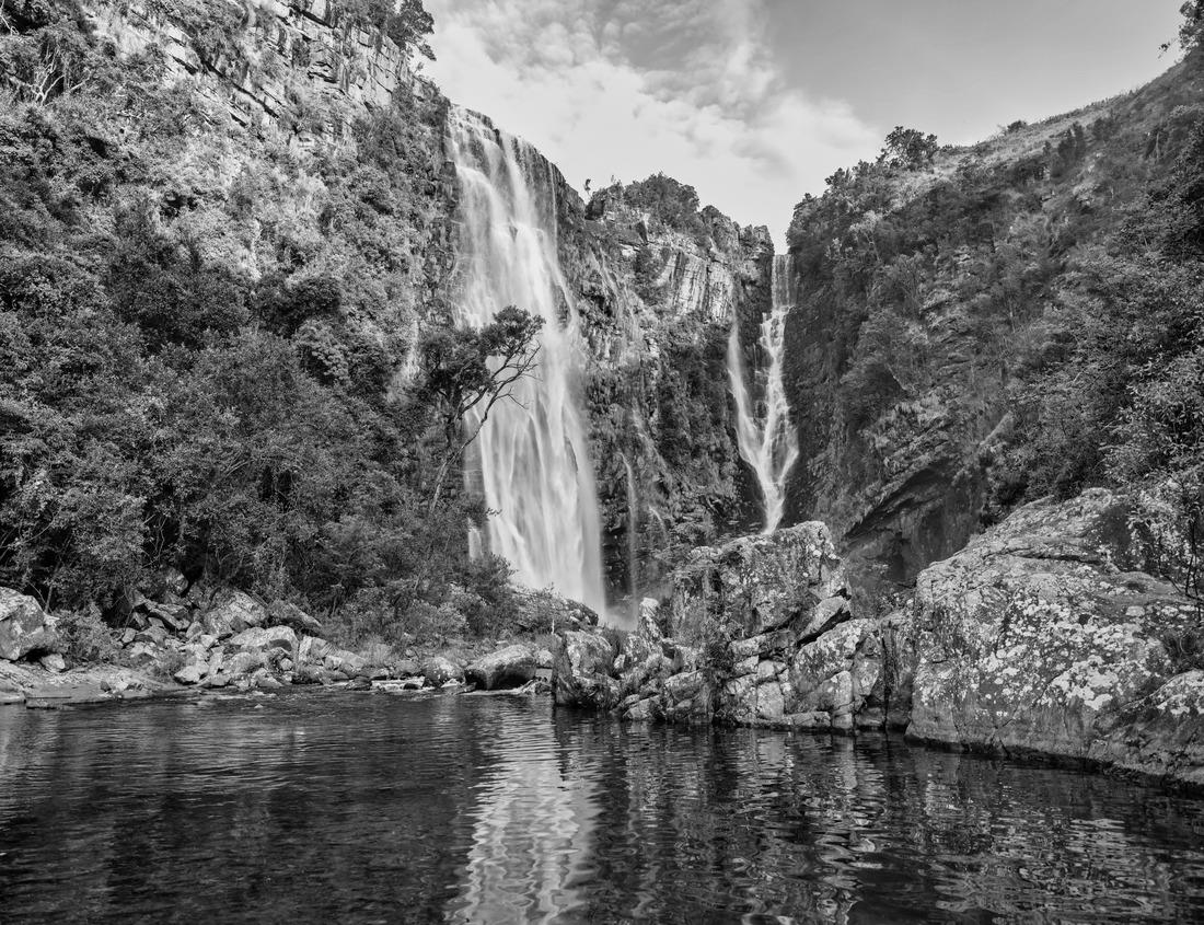 Noah Jigsaw Puzzle Orange tent on the rocky beach of an island on a trout lake in northern Minnesota in the fall in black white 1000 pieces
