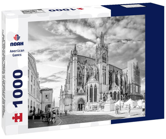 Noah Jigsaw Puzzle Cliffs in the nearby of Tanah Lot Temple, Bali, Indonesia. There is an arch in the water. The waves are splashing on the cliffs and smaller rocks. Water stays on the flat surfaces. Power of the nature in black white 1000 pieces