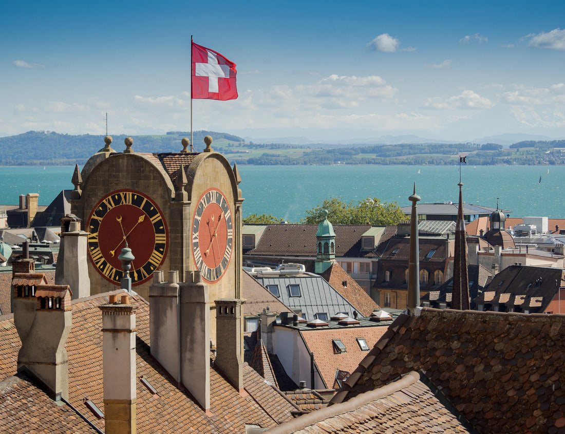 The Swiss flag waves at the top of the clock tower (Tour Diesse) in Neuchâtel 1000pc Puzzle