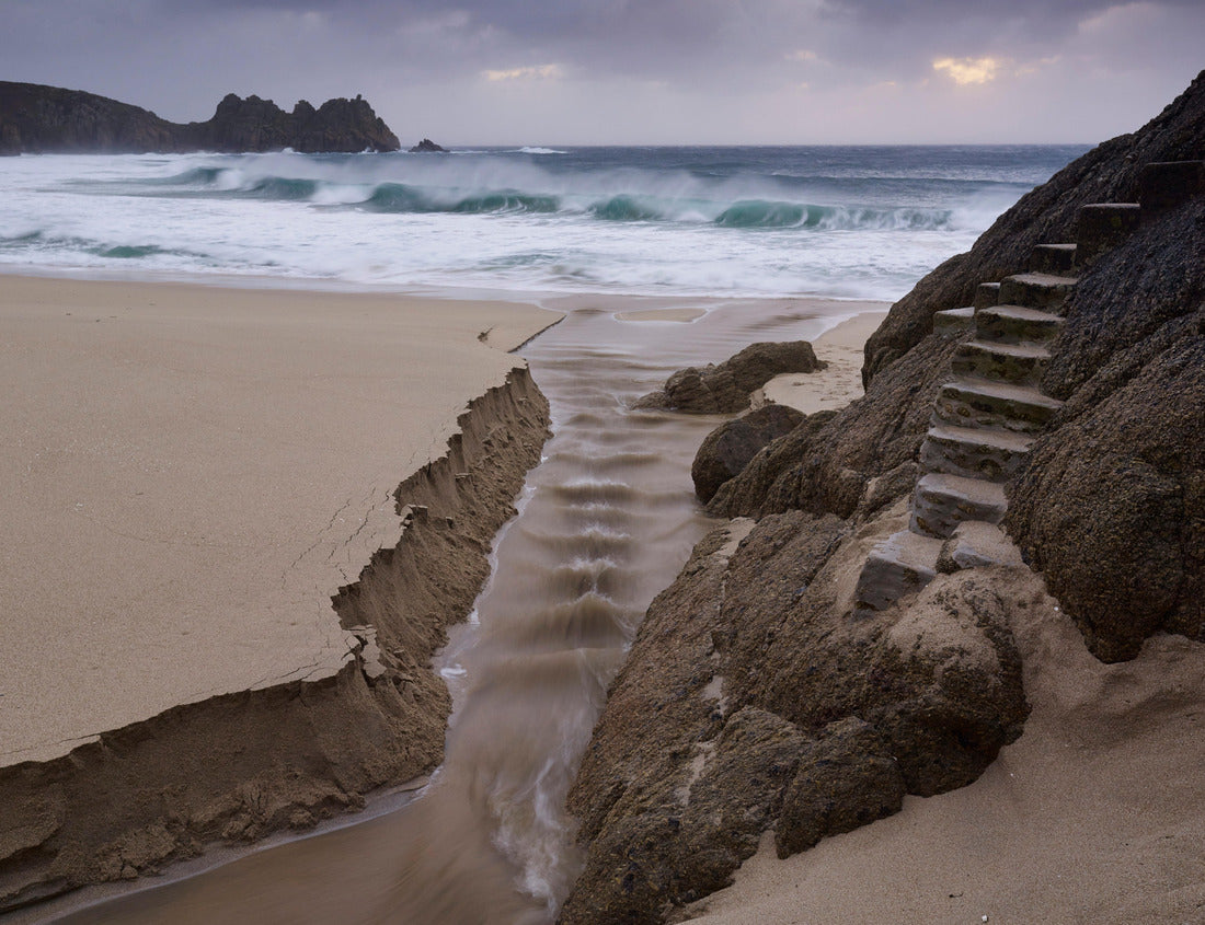Stormy conditions on the beach overlooking Rock Logan at Porthcurno, Cornwall, England, Great Britain 1000pc Puzzle