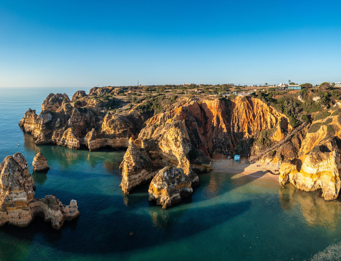 Noah Jigsaw Puzzle Camilo beach (Praia do Camilo) in Lagos, Algarve, Portugal. Wooden footbridge to the beach Praia do Camilo, Portugal. Picturesque view of Praia do Camilo beach in Lagos, Algarve region 1000 pieces