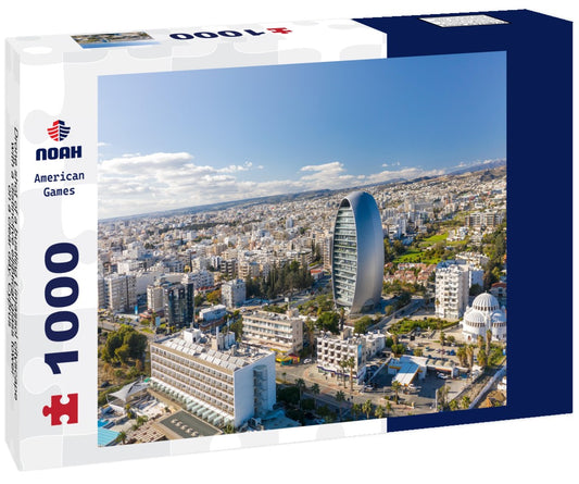 Noah Jigsaw Puzzle Drone shot of a bustling Limassol cityscape with a distinctive elliptical glass tower on a clear day. Cyprus 1000 pieces