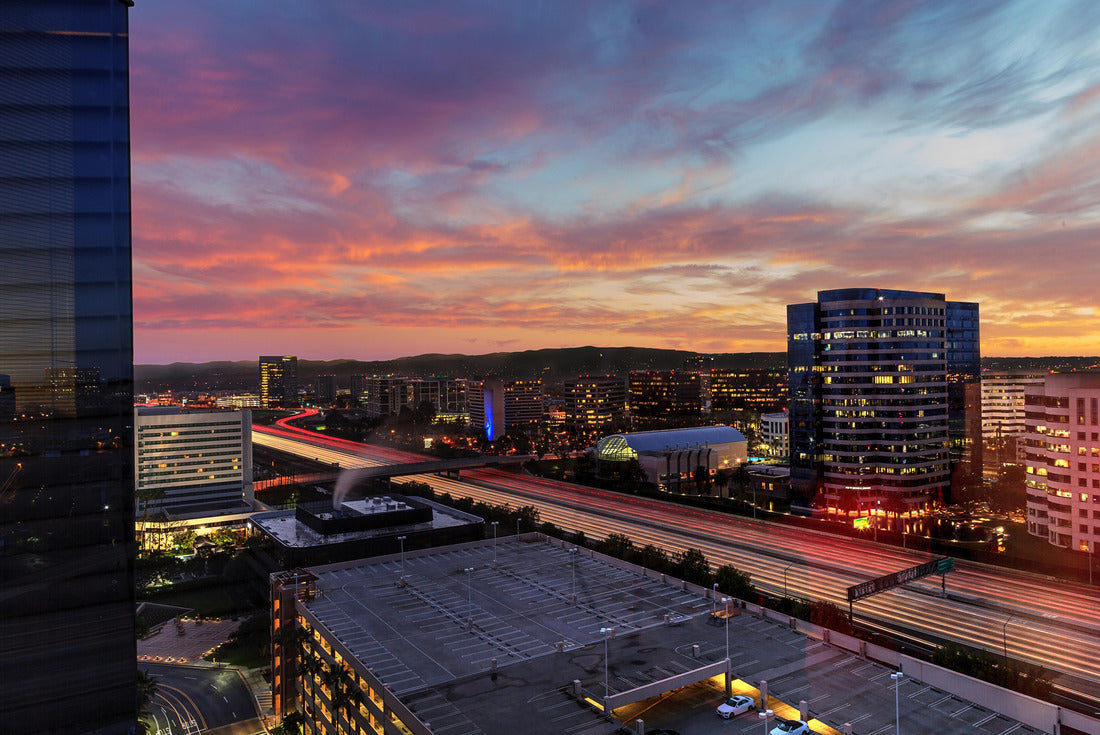 Noah Jigsaw Puzzle Sunrise over light trails and city lights on a highway in Irvine, California, USA 2000 pieces