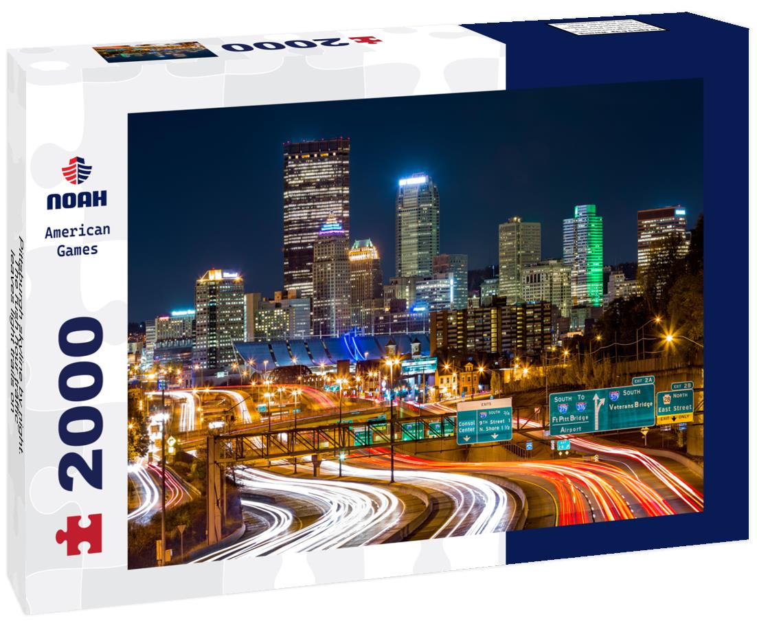 Noah Jigsaw Puzzle Pittsburgh skyline by night. The rush hour traffic leaves light trails on I-279 parkway 2000 pieces