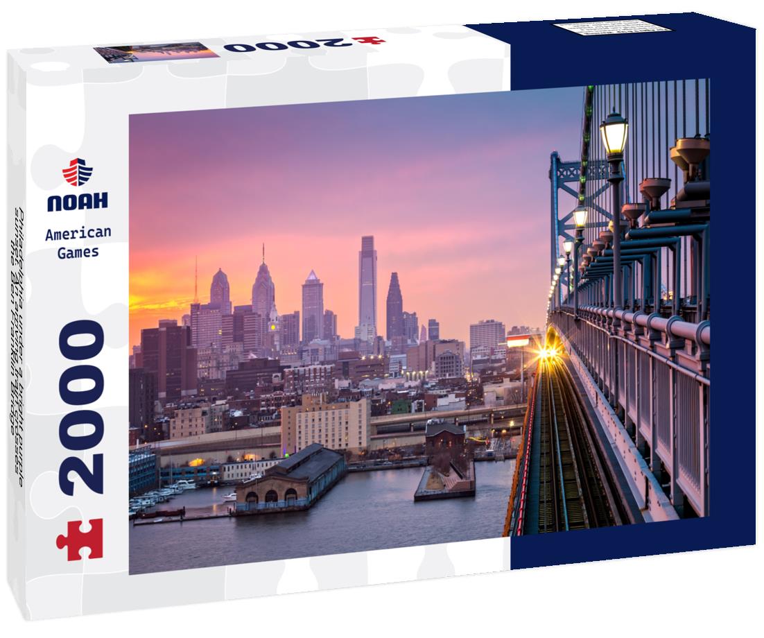 Noah Jigsaw Puzzle Philadelphia under a bright purple sunset. An arriving train crosses the Ben Franklin Bridge 2000 pieces