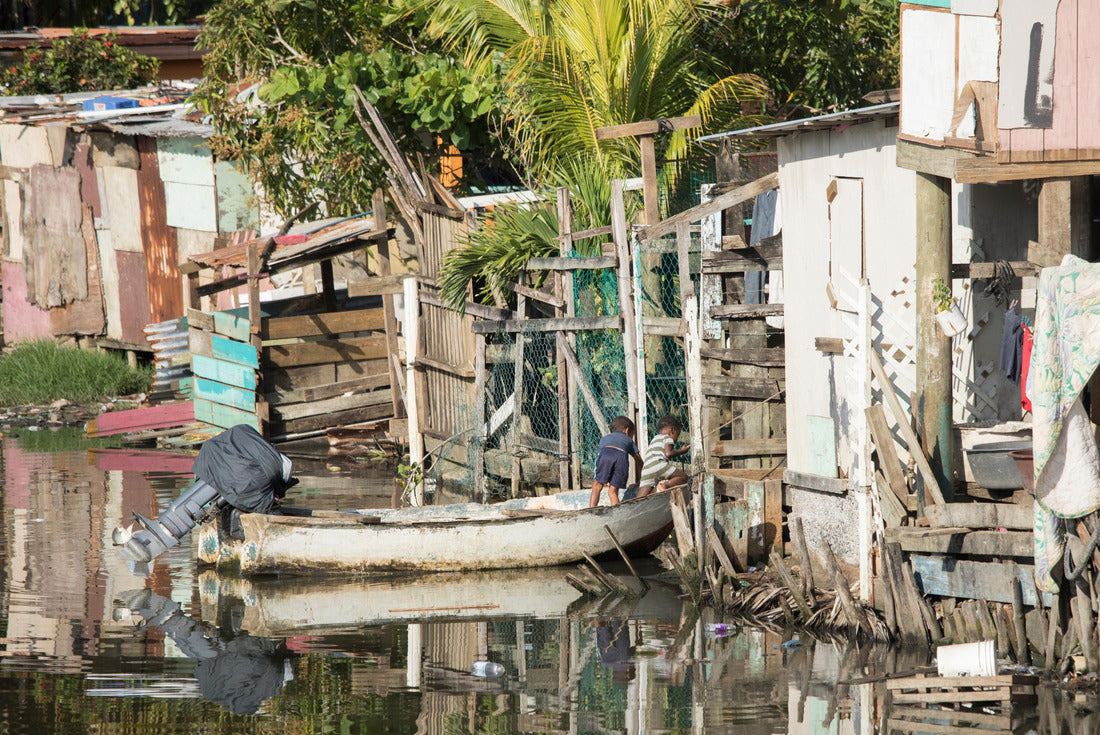 Kids play in a boat in a waterfront slum in Honduras 2000pc Puzzle