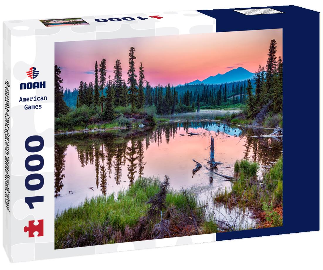 Noah Jigsaw Puzzle A smoky hare hangs over the distant mountains as the sun descends over a lake in Wrangell-St Elias National Park, Alaska 1000 Pieces