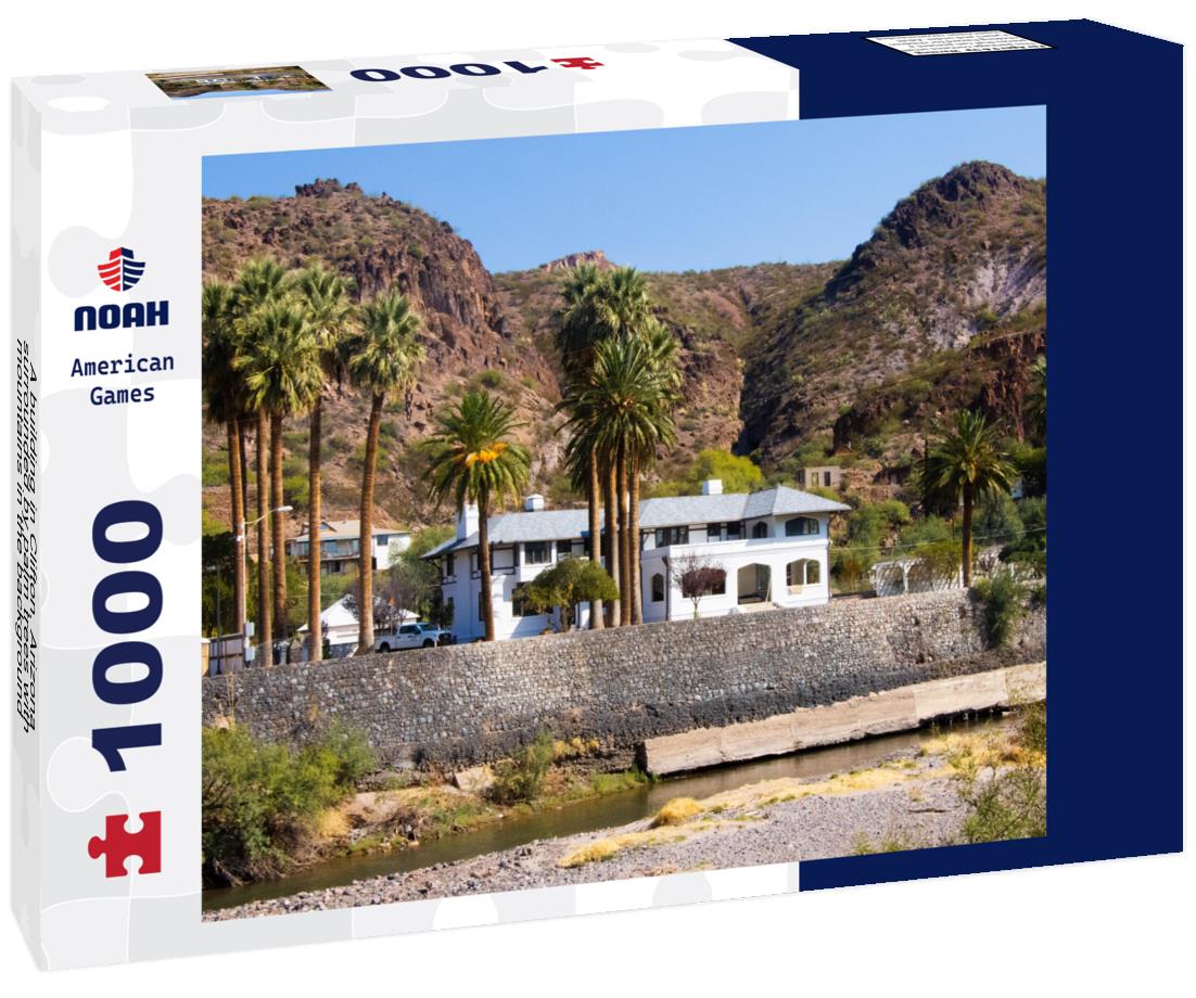 Noah Jigsaw Puzzle A building in Clifton, Arizona, surrounded by palm trees with mountains in the background, in Greenlee County, USA 1000 Pieces