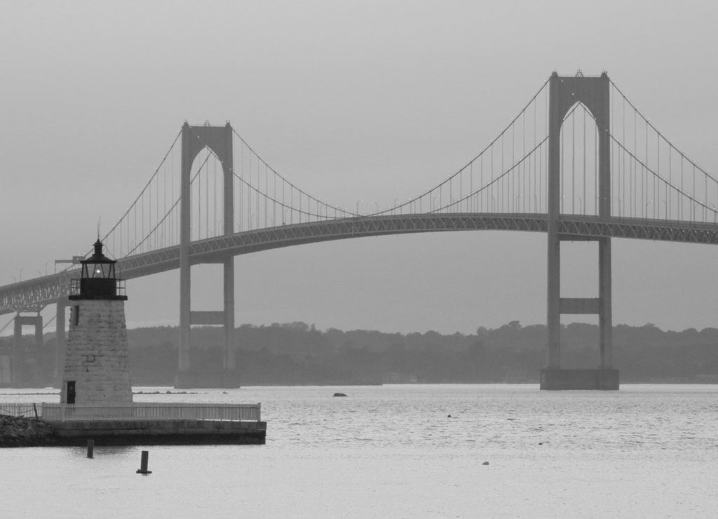 A sunset over the Newport Bridge in Newport, Rhode Island in black white