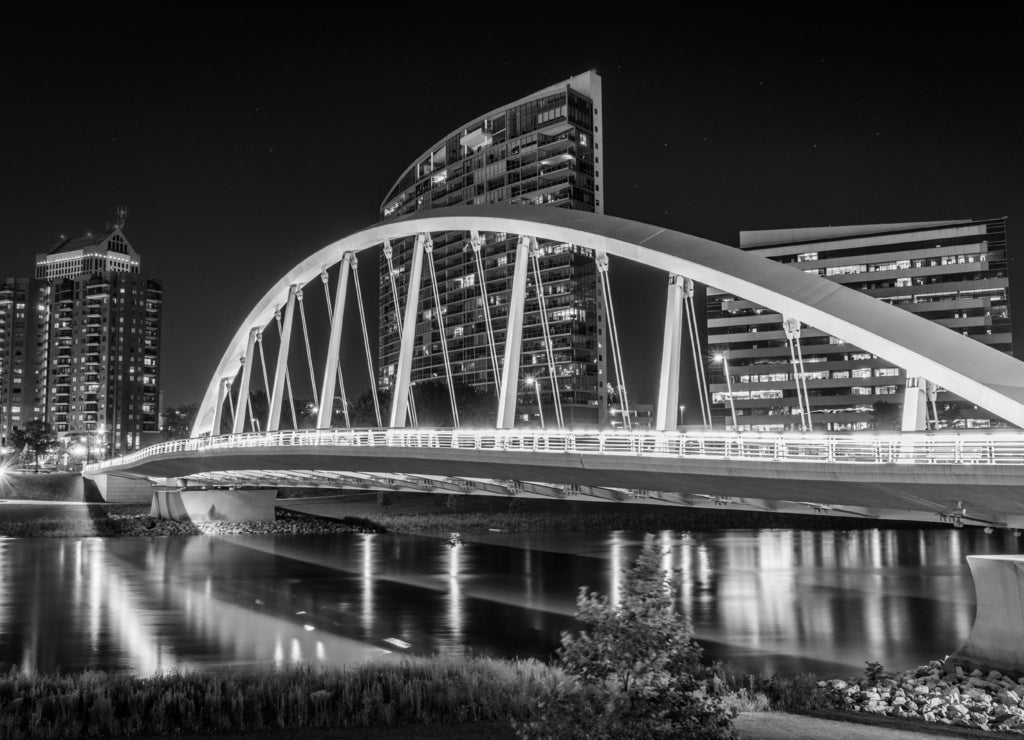 Skyline of Columbus, Ohio from Bicentennial Park bridge in black white