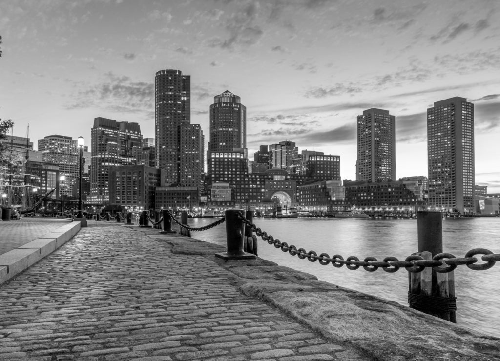 Boston Harbor and Financial District view from harbor on downtown, cityscape at sunset, Massachusetts, USA in black white