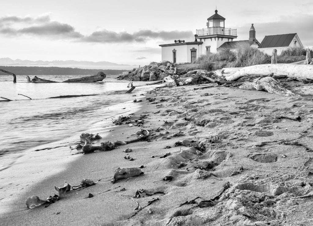 Sun set at West Point Lighthouse at Seattle Washington in black white