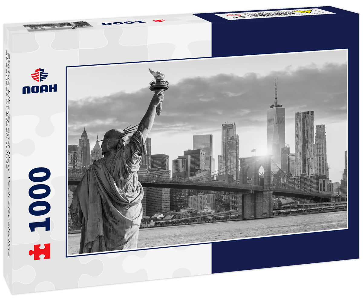 Statue Liberty and New York city skyline at sunset in black white