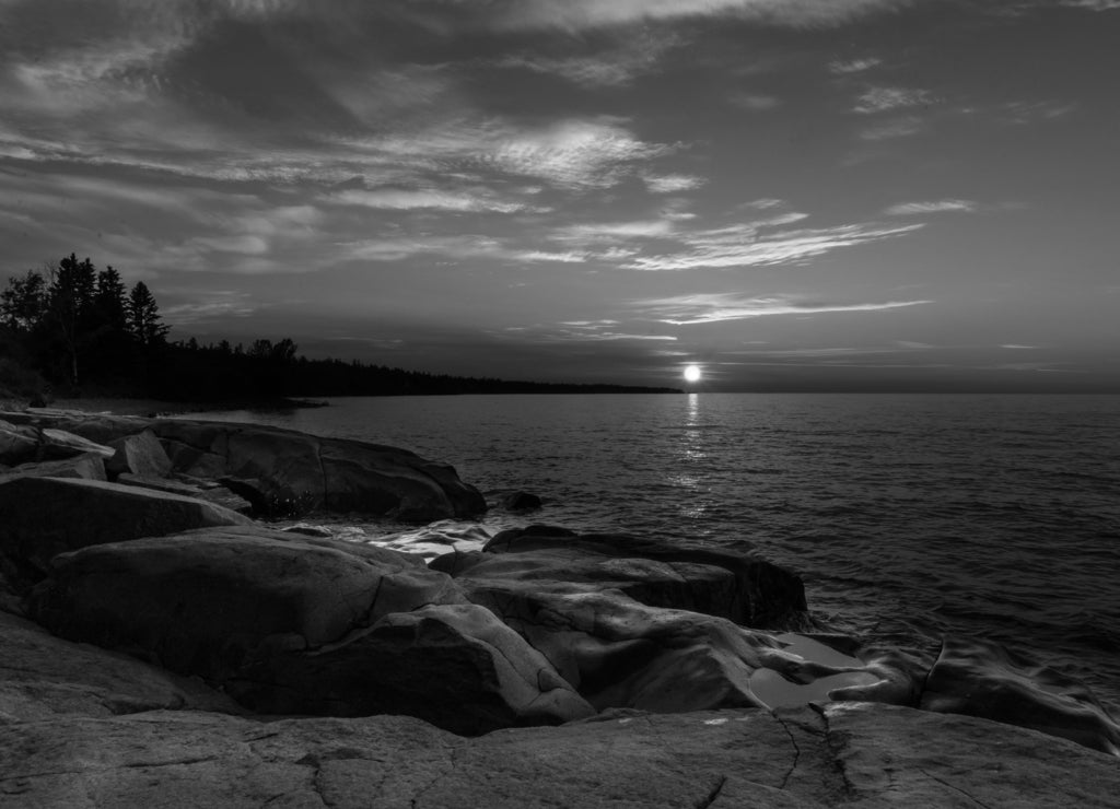 Sunrise on Lake Superior in northern Minnesota in black white