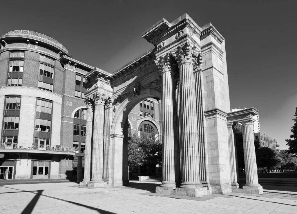 Arch Park in McFerson Commons in the Arena District of downtown Columbus, Ohio is a popular urban destination for sports and entertainment in black white